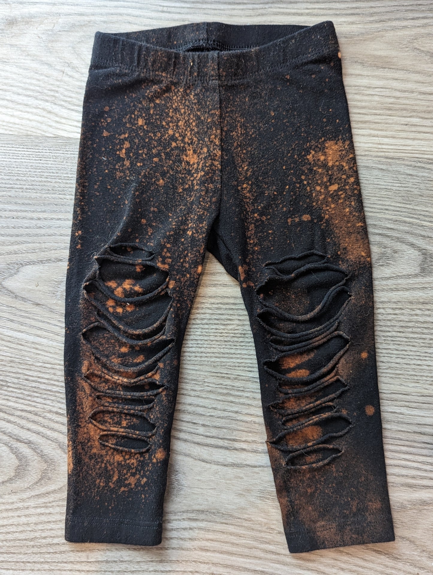 Bleached shredded black leggings